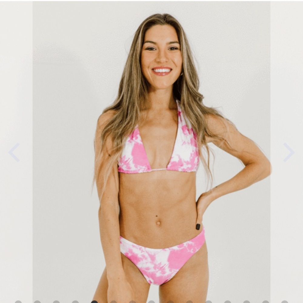 NEVER WORN + BRAND NEW. Size medium. Aurelle swim.